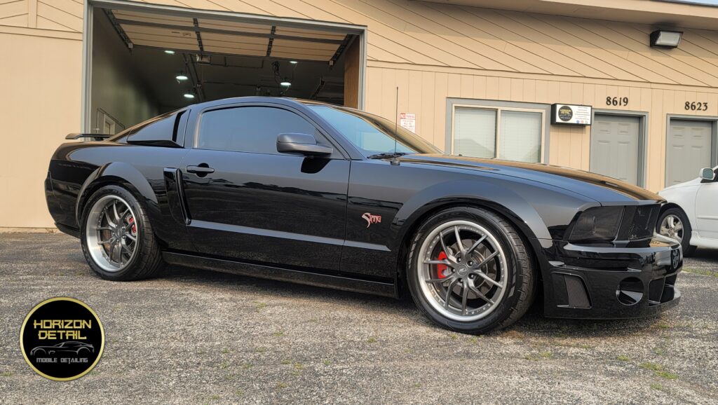 Black Ford Mustang completely paint corrected and coated with 5 year ceramic coating