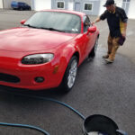 2008 Mazda Miata in for paint correction and ceramic coating receiving it's decon wash