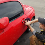 2008 Mazda Miata in for paint correction and ceramic coating decon wash under door handle brush out and decontamination