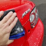 2008 Mazda Miata in for paint correction and ceramic coating decon wash clay treatment and mechanical decontamination