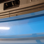 Deep Damage Rear Bumper Hatch Area After