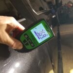 Duramax Paint Correction - In Progress - Thin Spot Identified In Paint - 2.89mils. This is the danger zone for thin paint on this vehicle