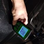 Duramax Paint Correction - In Progress - Thin Spot Identified In Paint - 2.89mils. This is the danger zone for thin paint on this vehicle