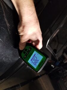 Duramax Paint Correction - In Progress - Thin Spot Identified In Paint - 2.89mils. This is the danger zone for thin paint on this vehicle