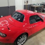 2008 Mazda Miata - Paint Correction and Ceramic Coating - Finished Pictures - Top of Car Under Lights - Horizon Detail Northwest Indiana - Crown Point and Saint John Indiana
